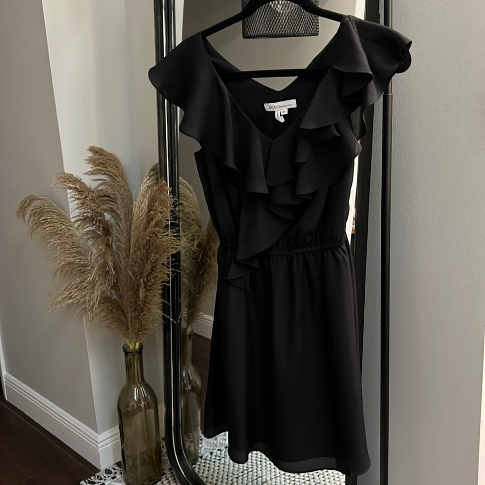 Little Black Dress with ruffle detail and pockets